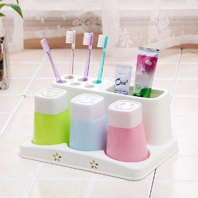 White Plastic Toothbrush And Toothpaste Holder